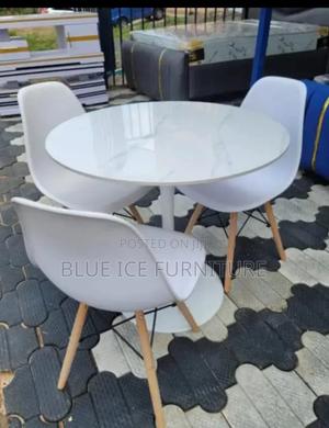 Marble Dining Table With White Eames Chair - main view