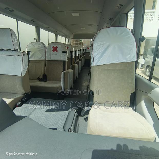 Toyota Coaster 2018 White - thumbnail 3