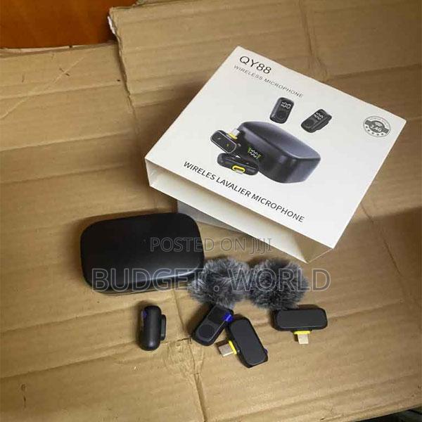 . Qy88 Rechargeable Wireless Microphone With Charging Box