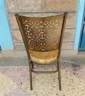 Restaurant Chair With Laser-Cut Designs and Durable Wooden Seat.