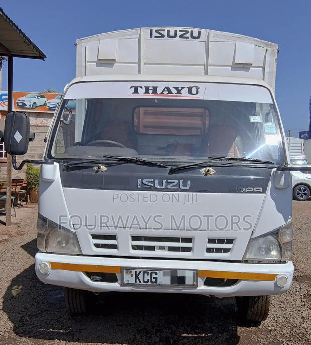 Isuzu NPR 2015 White - thumbnail 4