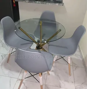 Top Glass and Grey Eames Chair Available Dining Table