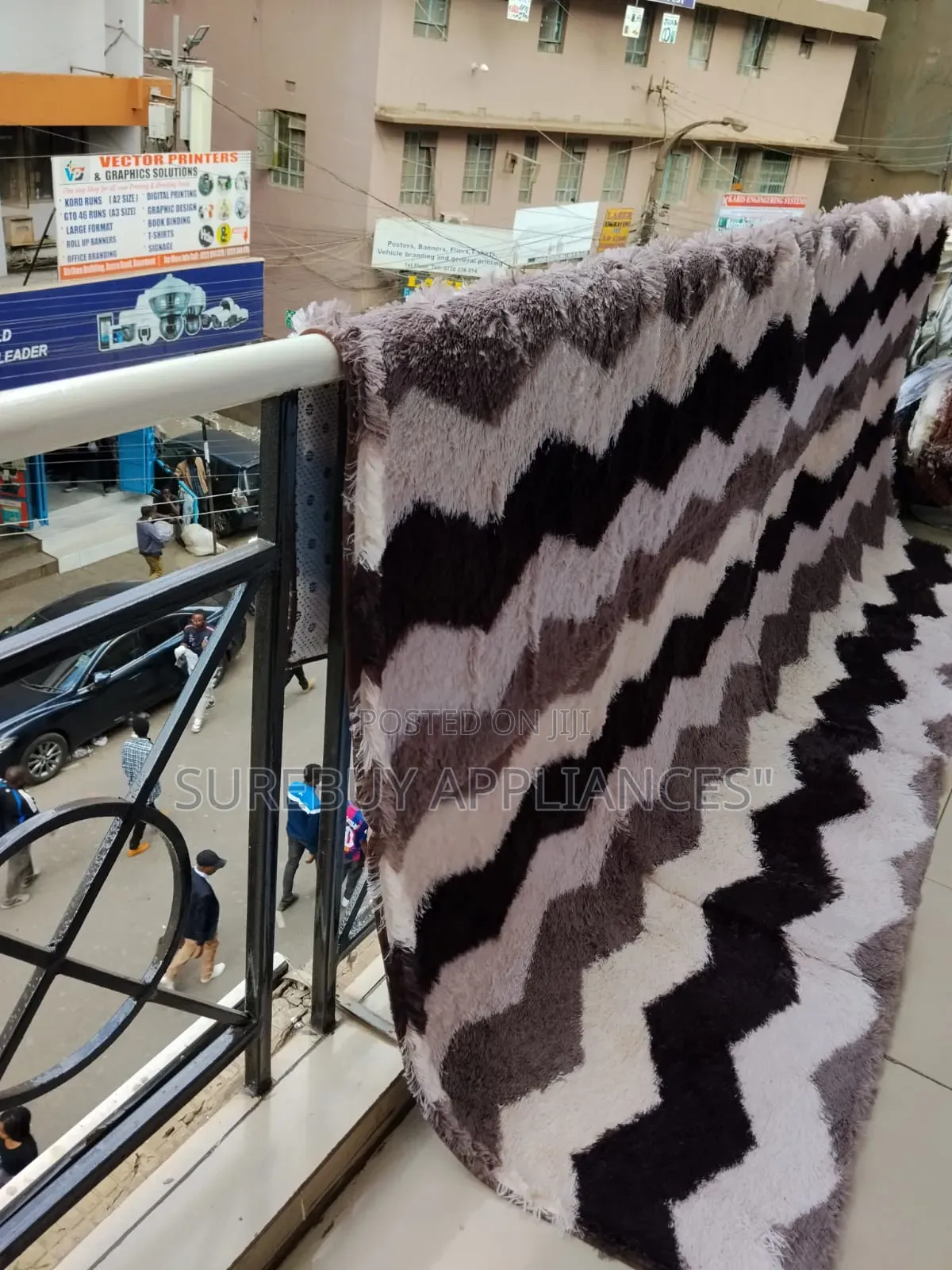 By 10ft Plush Patched Area Rug