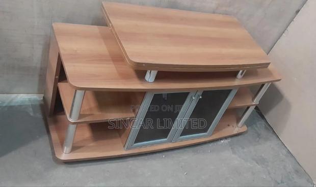A Wooden Top T.V Stand