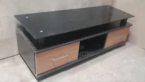 A Glass Top T.V Stand.