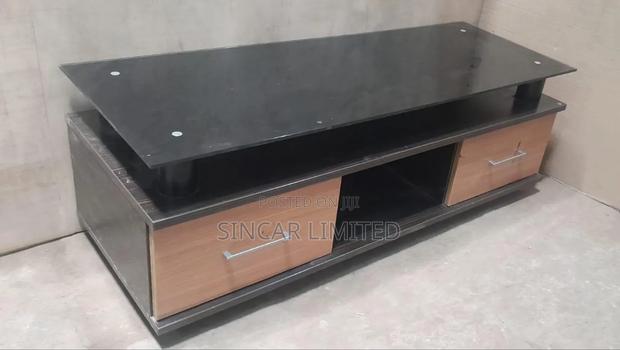 A Glass Top T.V Stand.