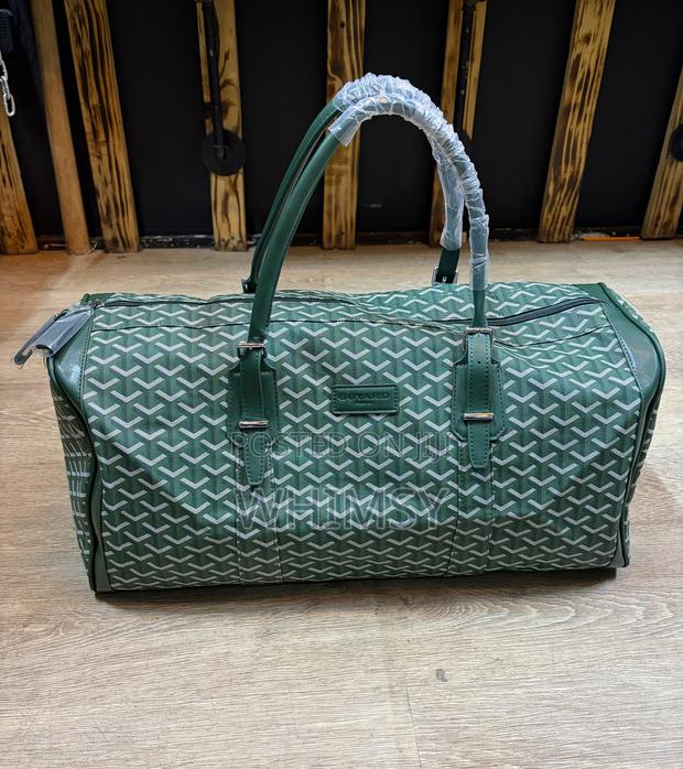 Goyard Boston 50 Duffle Bag Ft the Brand's Signature Goyardine Canvas.