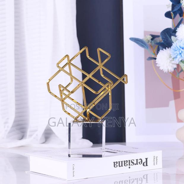 Gold Geometric Knot Statue With Crystal Base