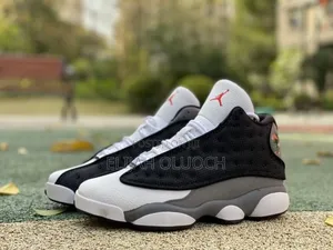 Air Jordan 13 Retro "Black Flint" Sneakers.