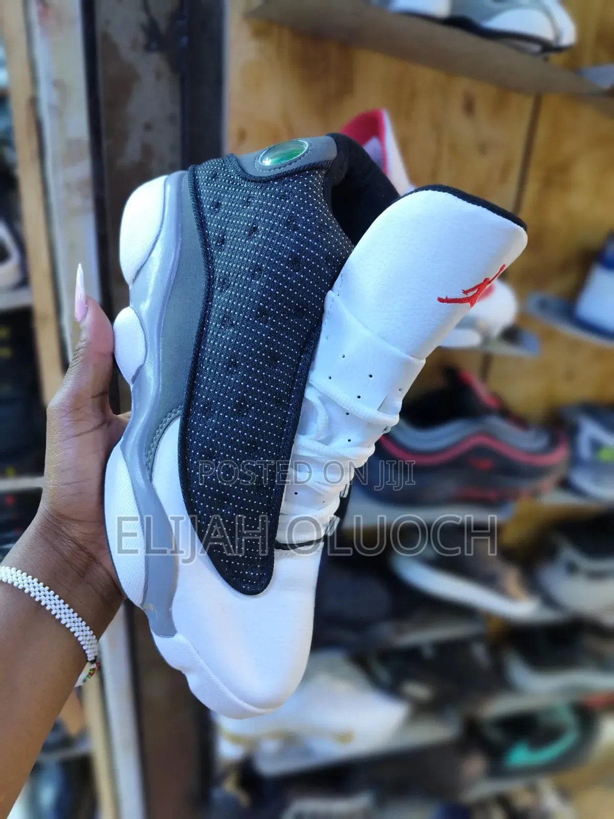 Air Jordan 13 Retro "Black Flint" Sneakers.