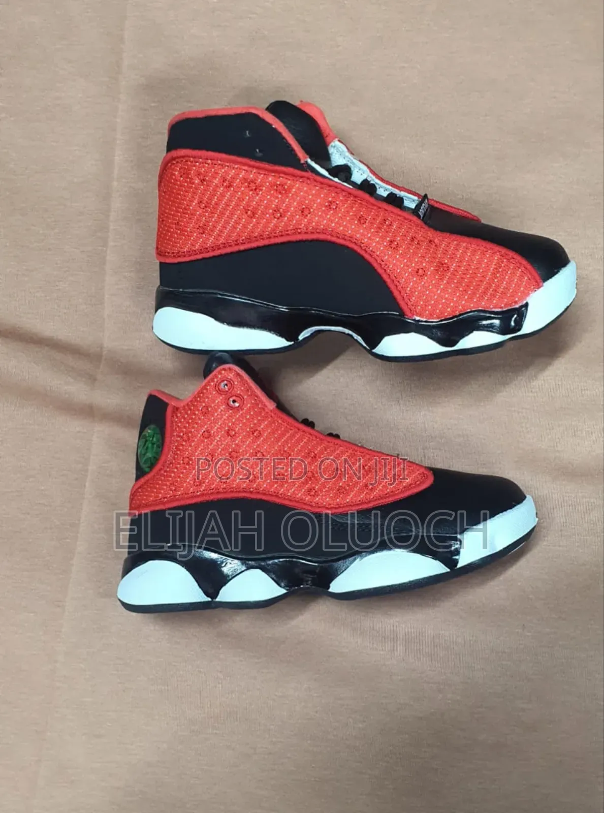 Air Jordan 13 Retro "Red Flint" Sneakers.