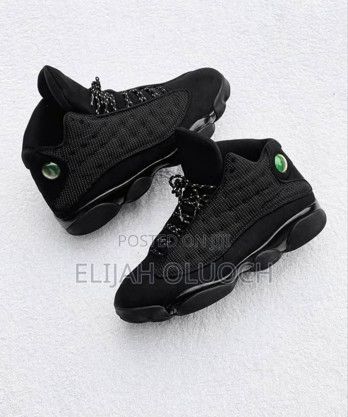 Air Jordan 13 Retro "Black Cat" Sneakers.