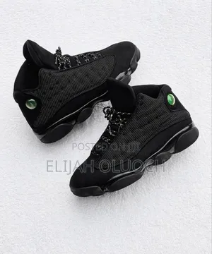 Air Jordan 13 Retro "Black Cat" Sneakers.