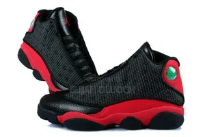 Air Jordan 13 Retro "Bred" Sneakers.
