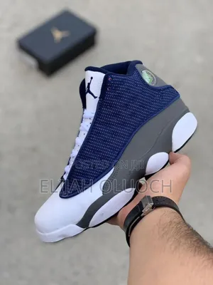 Nike Air Jordan 13 Retro "Flint" Sneakers.