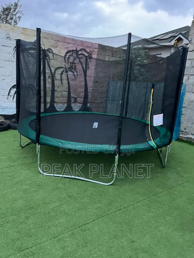 Children Jumping Trampoline