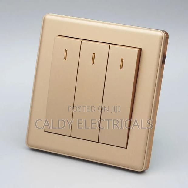 Gold-Colored, 3-Gang 2-Way Light Switch