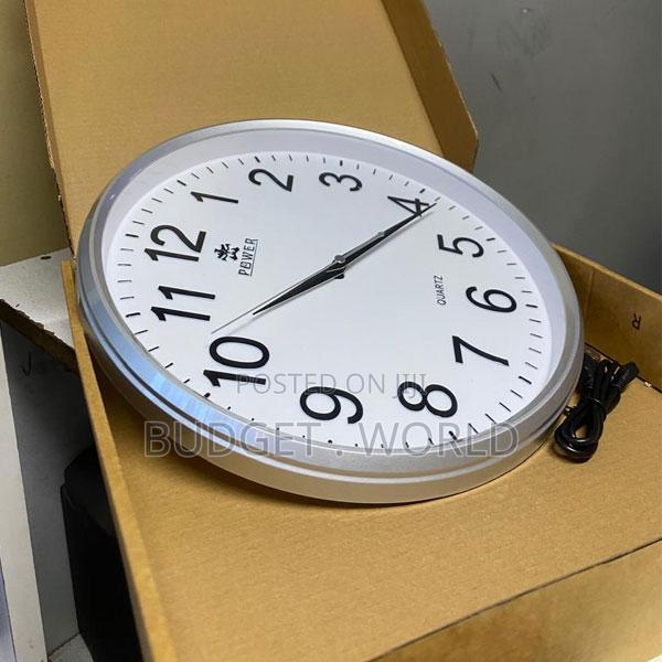 Classic 12-Inch White Wall Clock With Bold Black Numbers