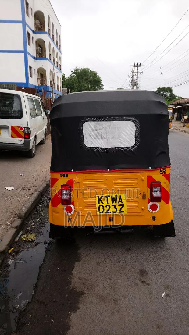 Bajaj RE 2014 Yellow - thumbnail 2