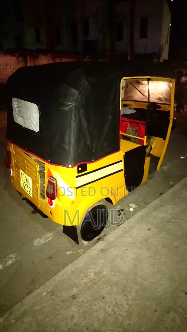Bajaj RE 2014 Yellow - thumbnail 3