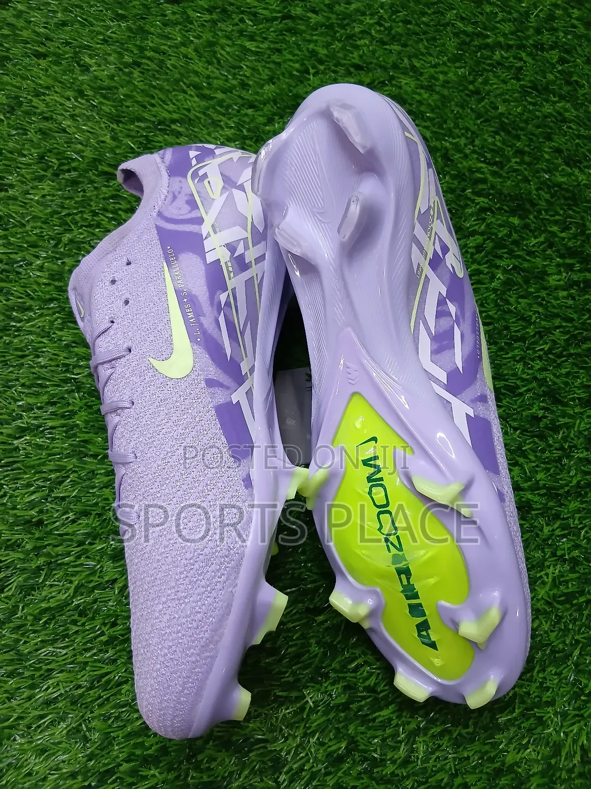 Nike United Purple Agate and Barely Volt Air Zoom Cleats