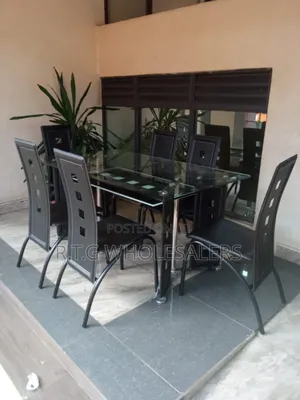 Executive 6 Sitter Glass Dinning Table With Leather Seat