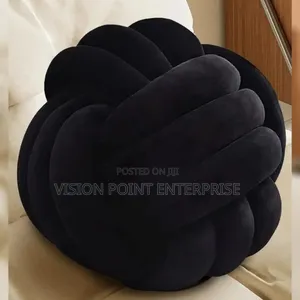 Round Knot Throw Pillows