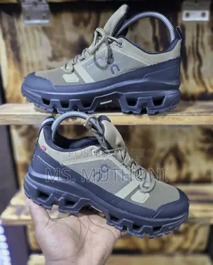 On Cloudrock Low Waterproof Hiking Shoe in the Hunter/Black Colorway