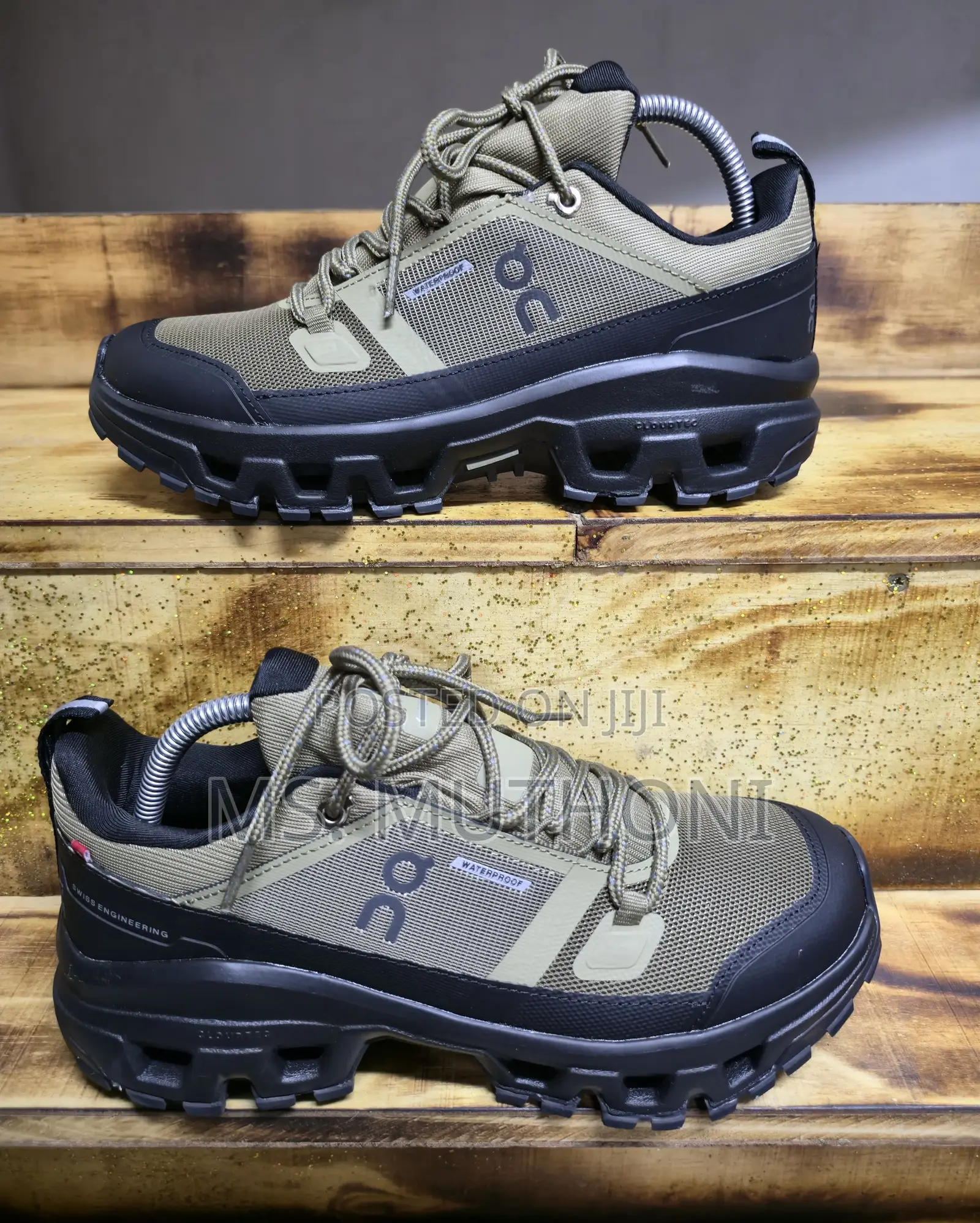 On Cloudrock Low Waterproof Hiking Shoe in the Hunter/Black Colorway