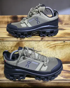 On Cloudrock Low Waterproof Hiking Shoe in the Hunter/Black Colorway