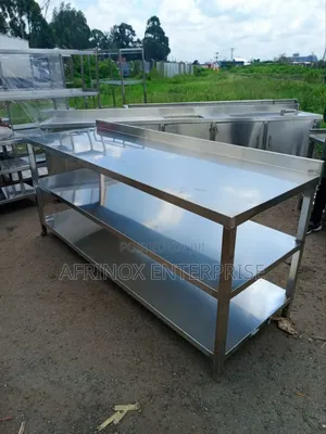 Stainless Table, Two Under Shelves. Food Handling Table