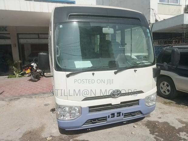 Toyota Coaster 2019 White - thumbnail 4