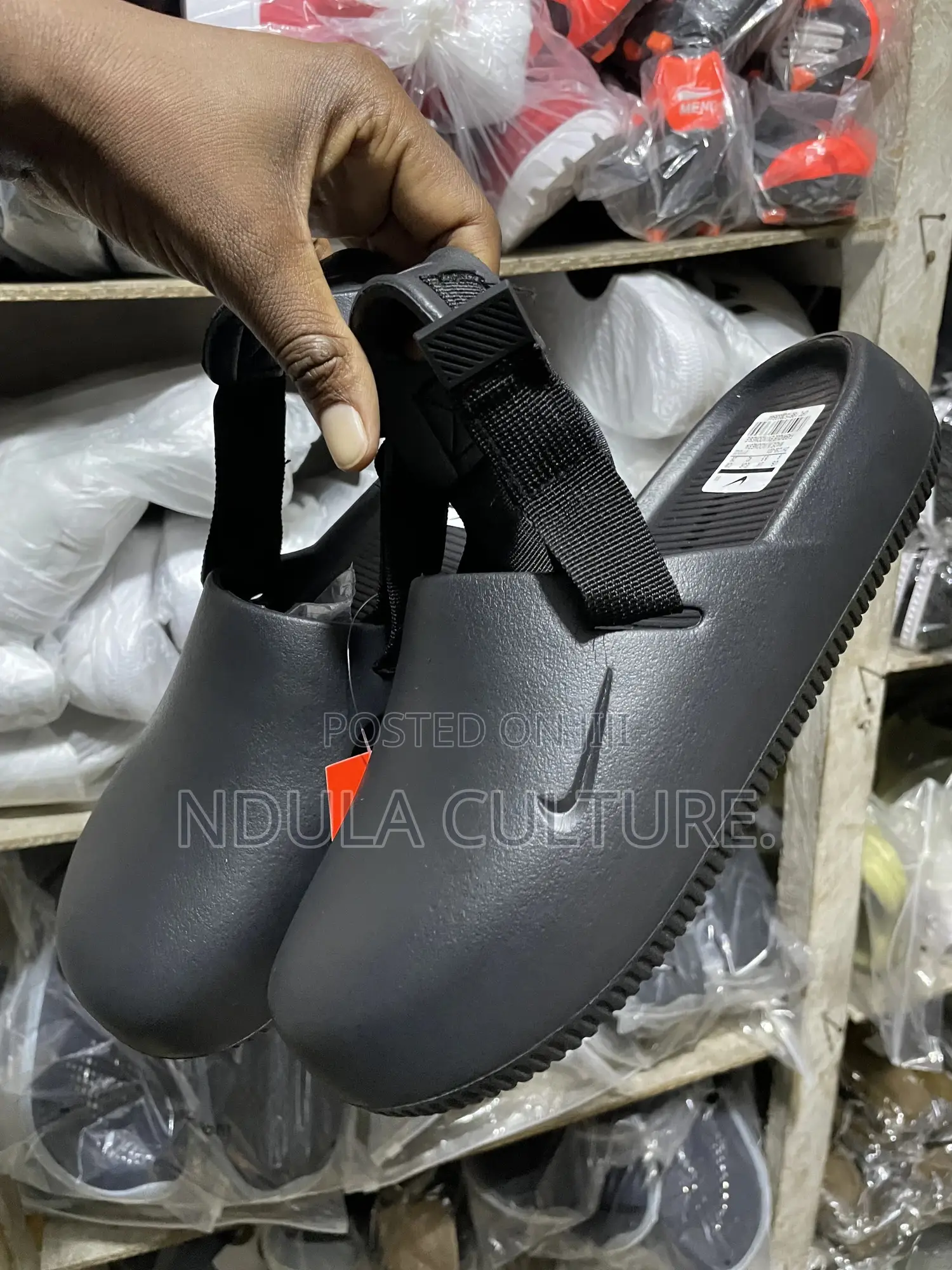 Nike Calm Mules and Slides