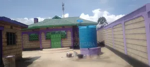 3 Plots 50 by 100 With Masons With Ready Title Deed