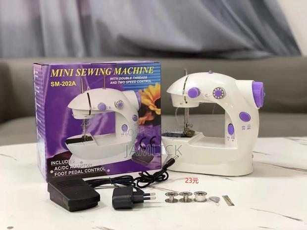 Mini Handheld Sewing Machine - Dv