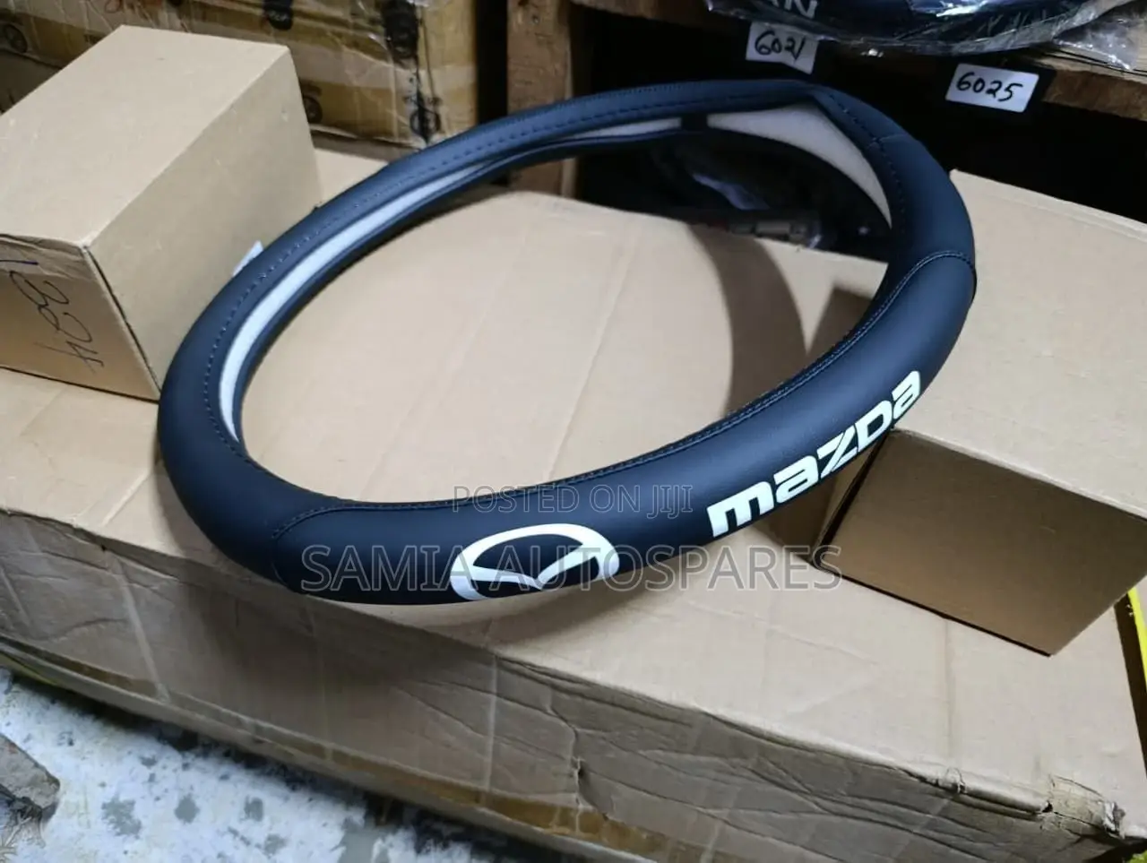 Mazda Steering Cover 
Leather Black White