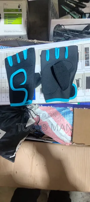 Gym Gloves. Pair of Half-Finger Fitness Gloves.