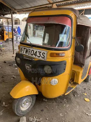 Bajaj RE 2022 Yellow