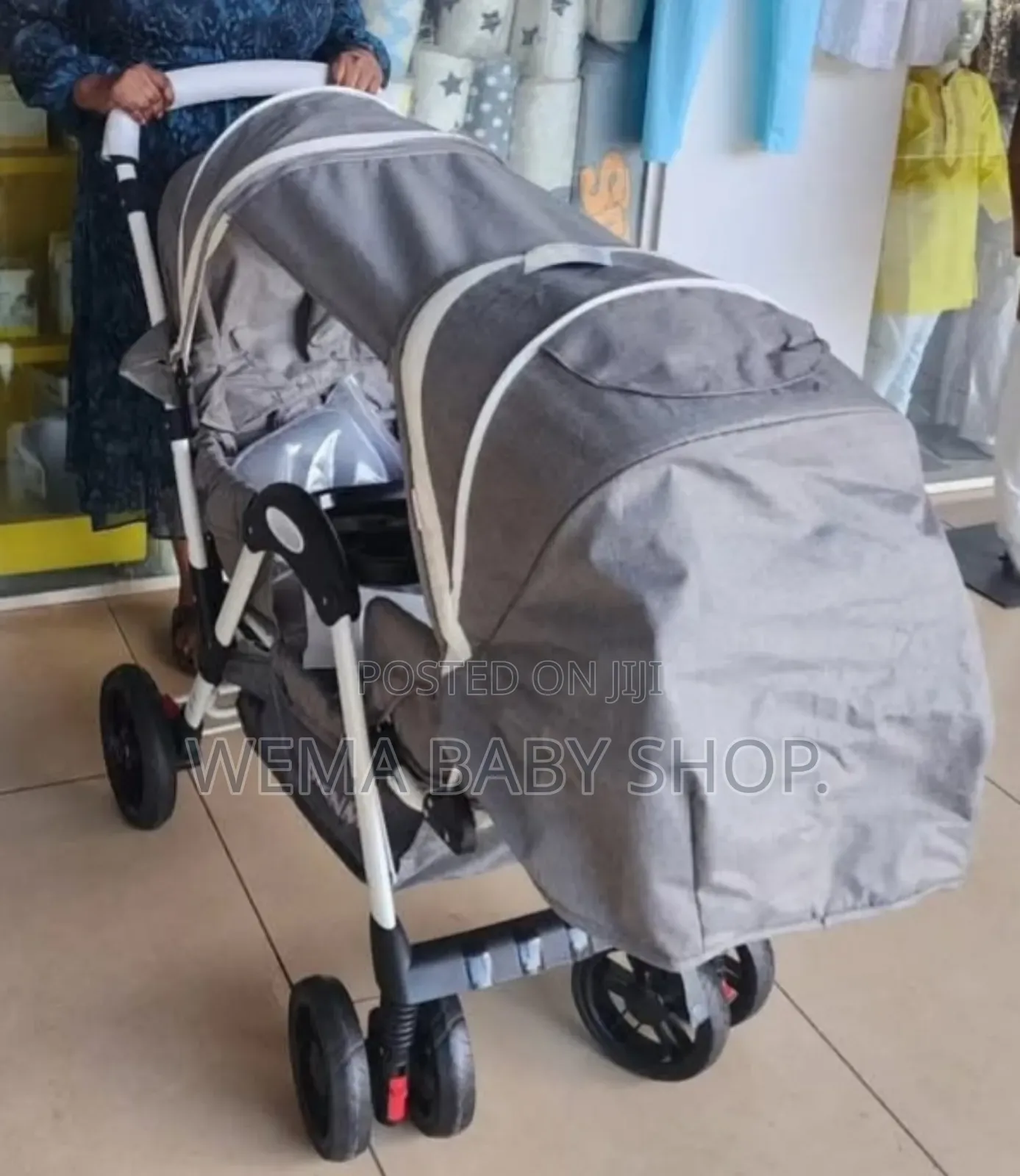 Tandem Twin Baby Stroller or Pushchair in Gray.
