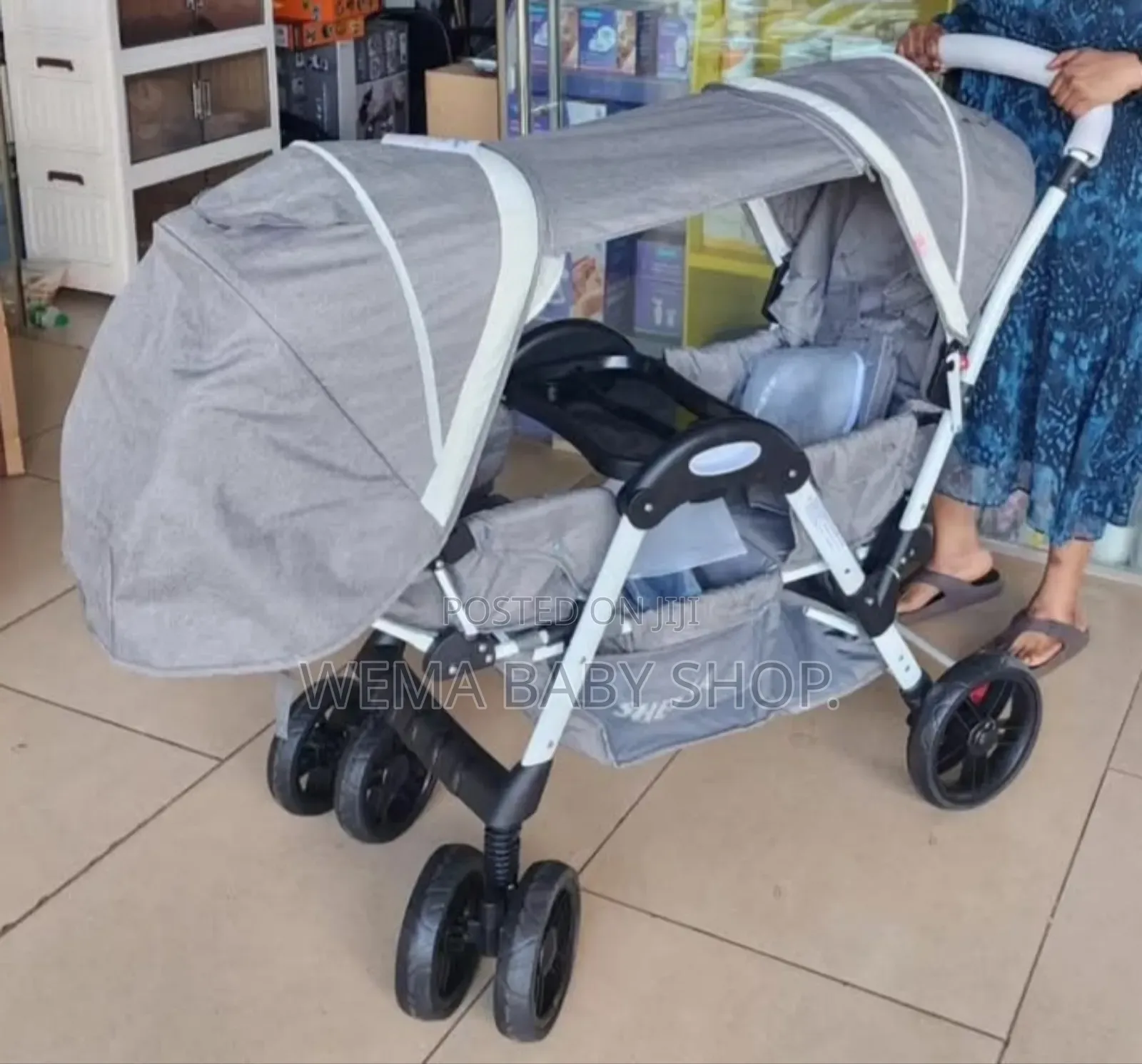 Tandem Twin Baby Stroller or Pushchair in Gray.