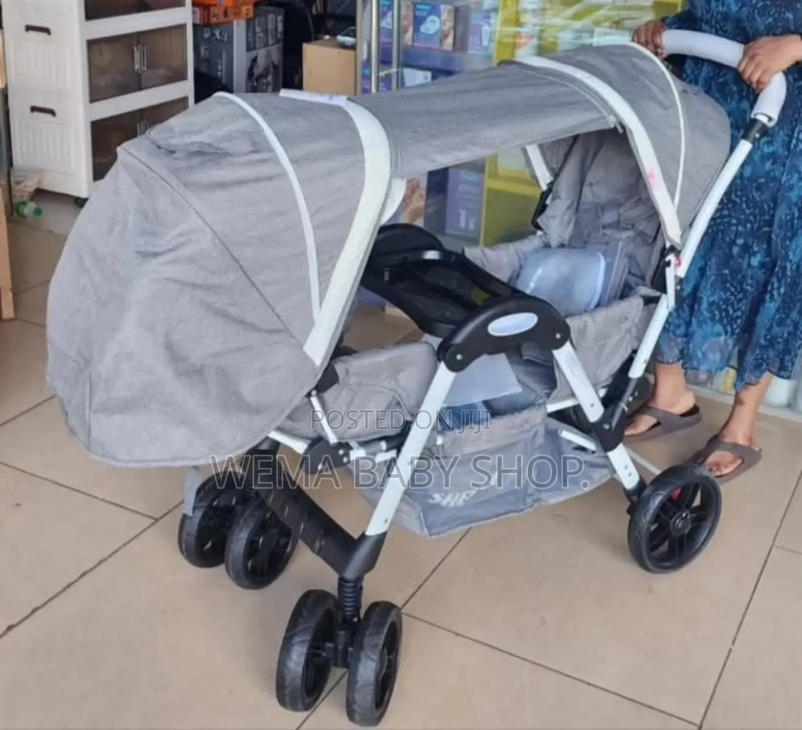 Tandem Twin Baby Stroller or Pushchair in Gray.