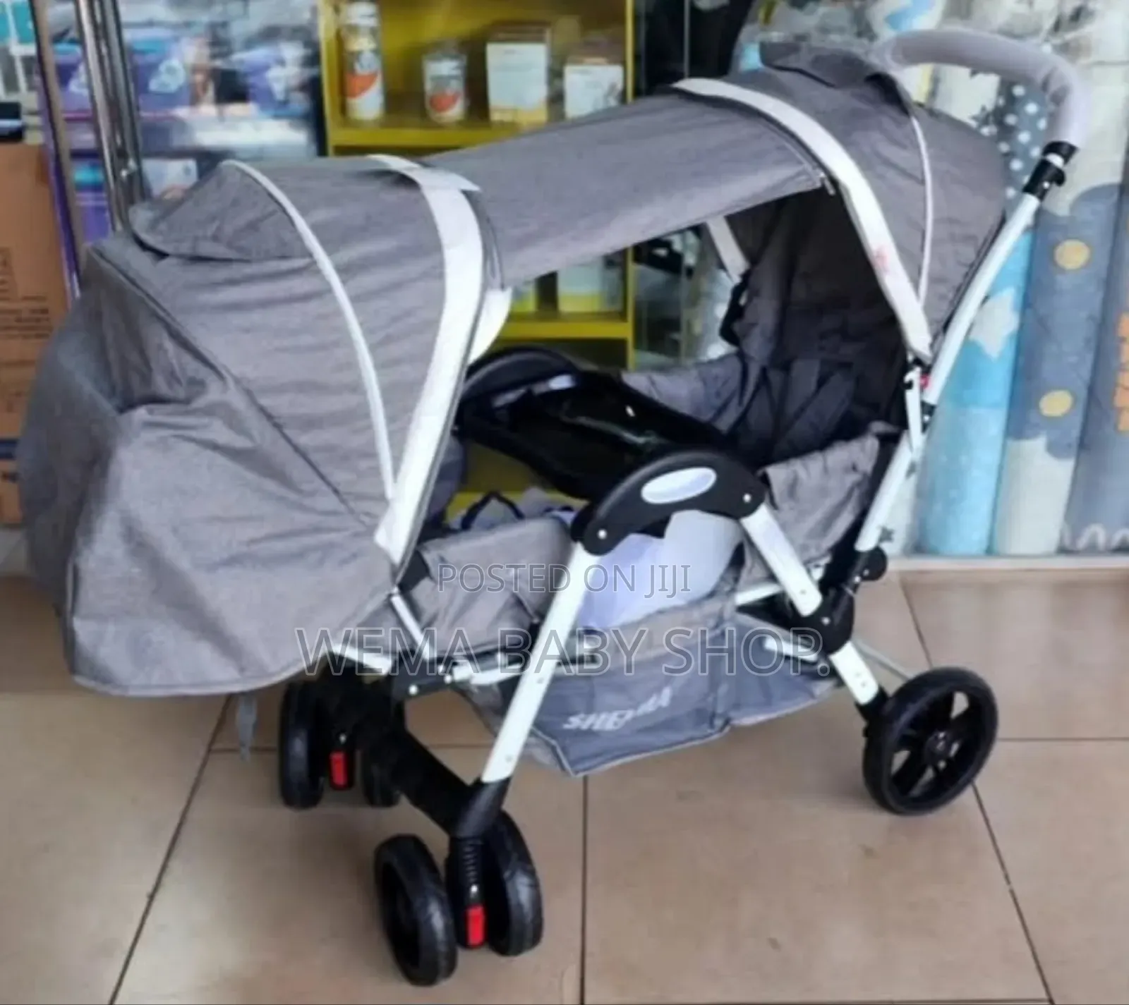 Tandem Twin Baby Stroller or Pushchair in Gray.