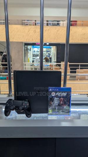 Preowned Ps4 Slim 500gb Console With 2 Controllers + Fc25 - main view