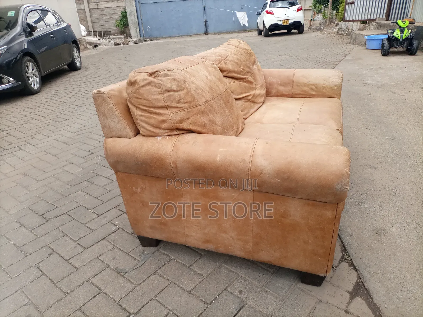 Laura Ashley Leather Sofa.