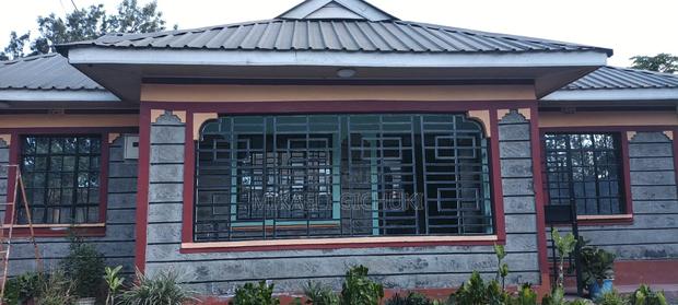 Plot and a Three Bedrooms House for Sale - main view