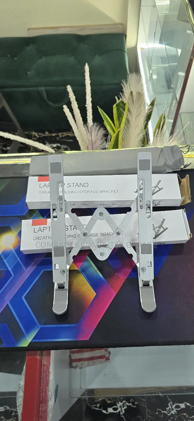 Foldable, and Portable Bracket Designed for Laptops and Tablets.