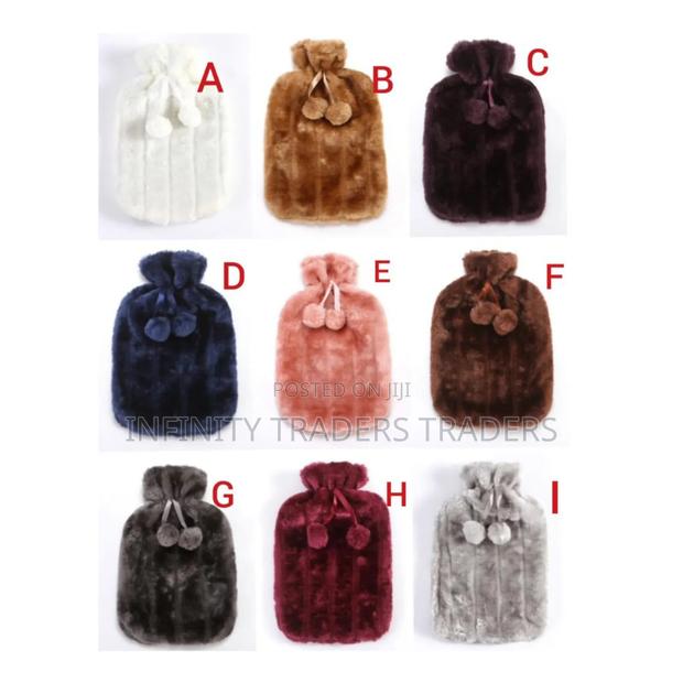 *Hot Water Bottles With Faux Fleece Cover.Capacity 2 Liters.