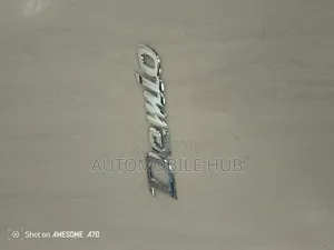 Demio Chrome Emblem Logo – Genuine Mazda Demio Rear Badge