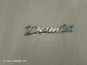 Demio Chrome Emblem Logo – Genuine Mazda Demio Rear Badge