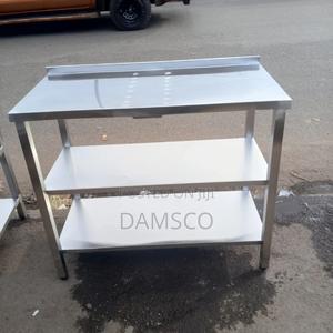 A Three-Tier Stainless Steel Working Table - thumbnail 2